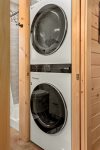 Full Size LG stackable washer and dryer in guest bathroom